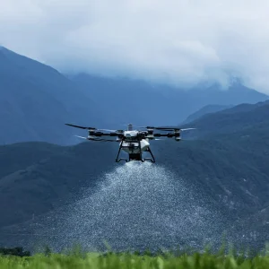 Agras T100 Spreading a field - Dronesolutions Schweiz GmbH
